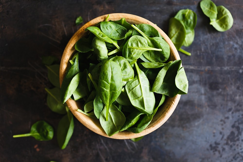 bowl of spinach leaves