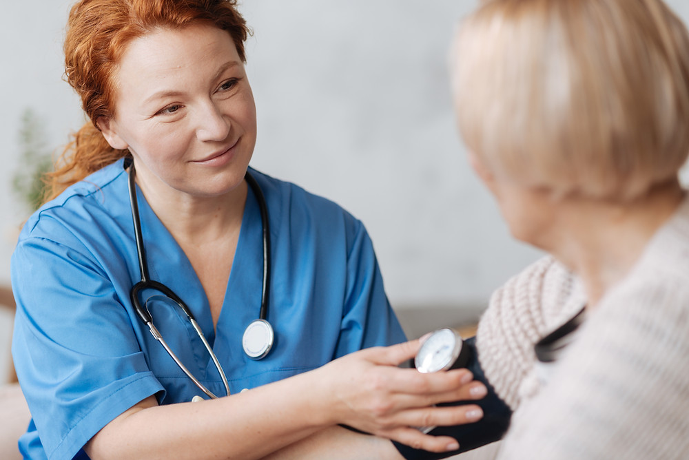 checking blood pressure