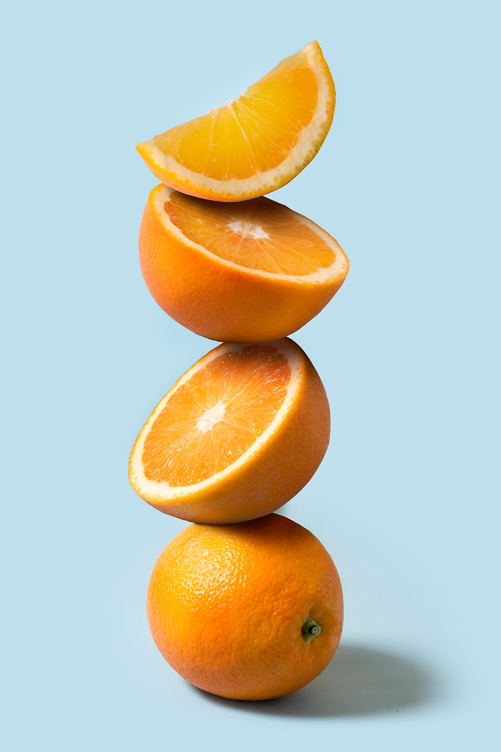 oranges stacked on top of each other